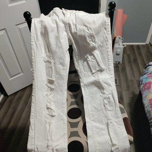 Ladies white jeans hand made distressed.